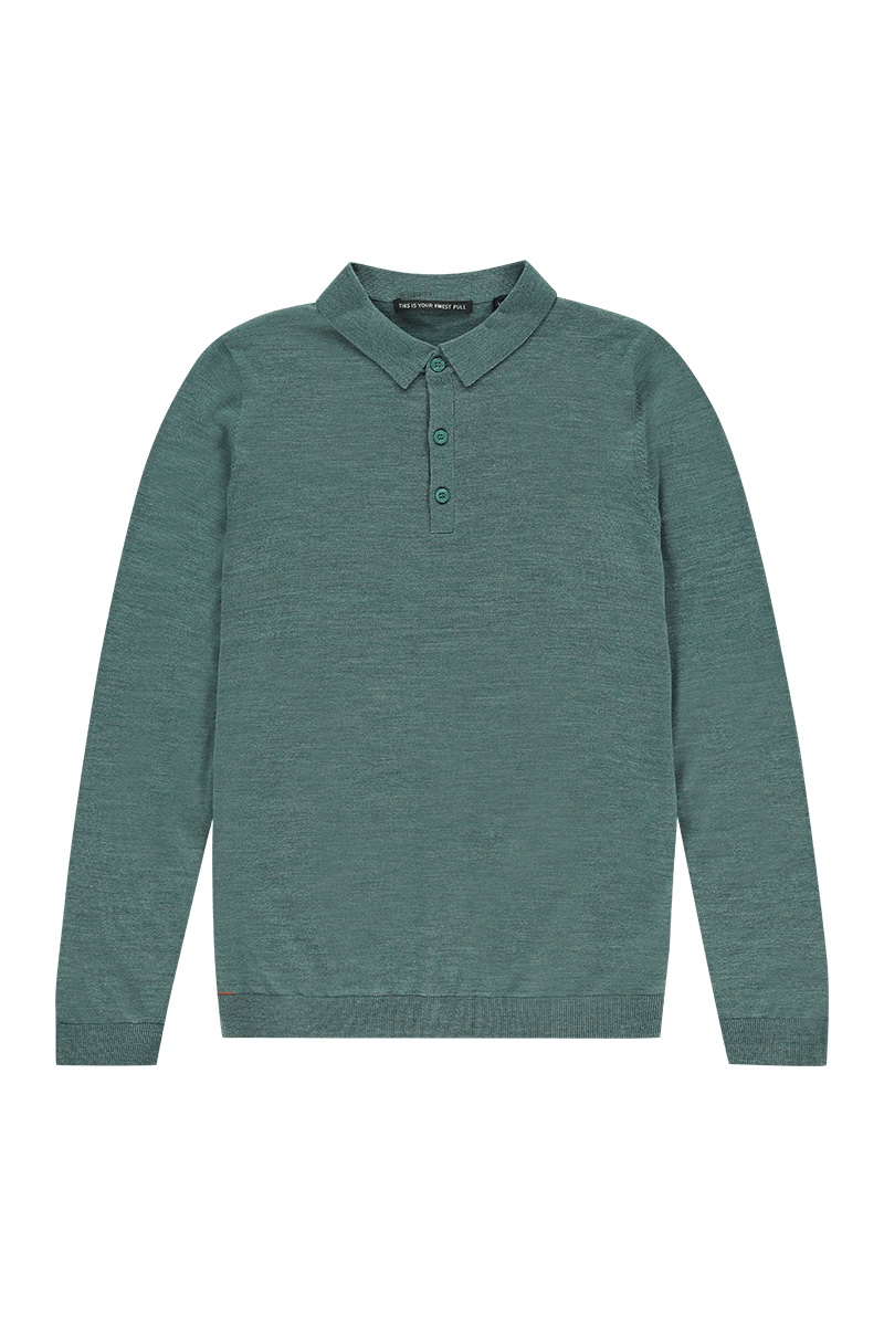Dunne polo met knopen in het groen